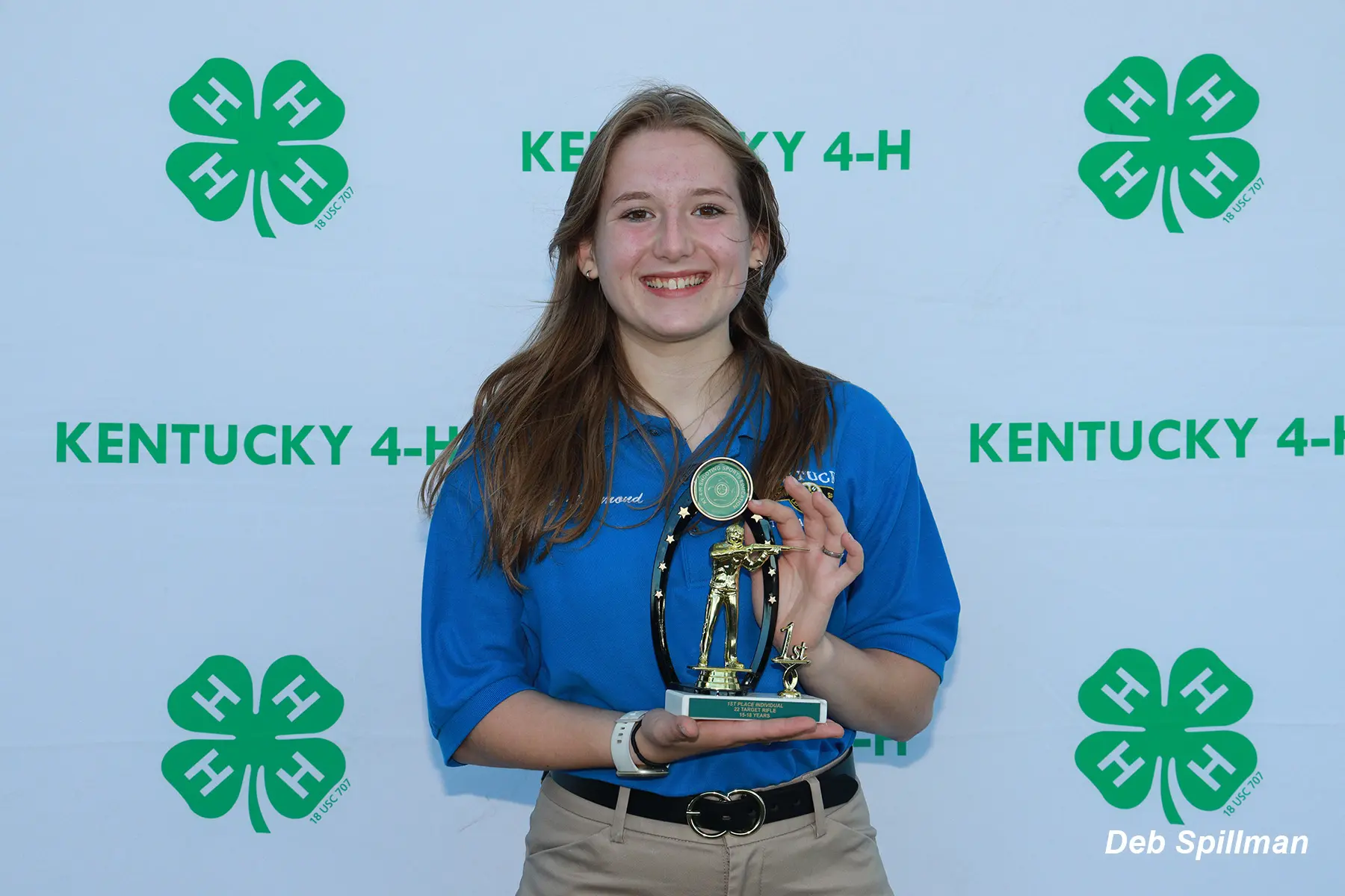 Girl with trophy | Kentucky 4-H Youth Advocacy Program