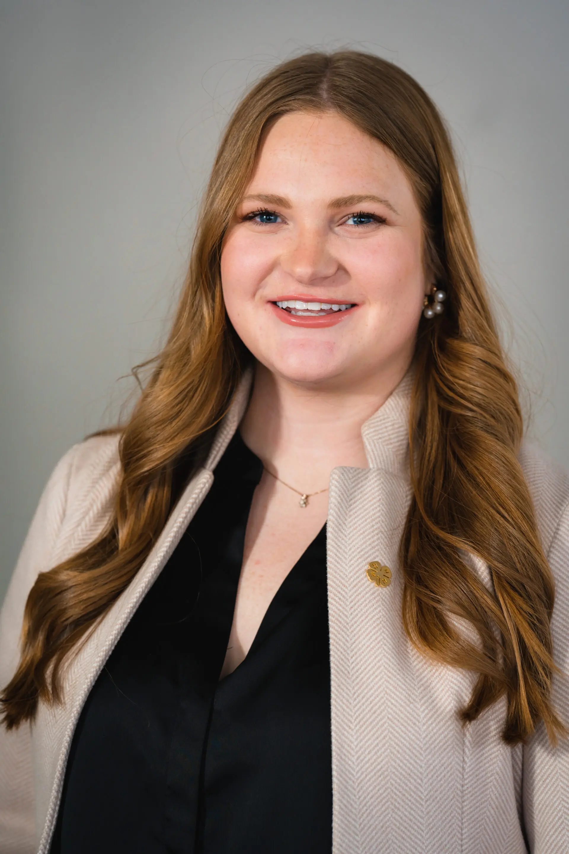 woman with brown and cream blazer | Kentucky 4-H Youth Advocacy Program