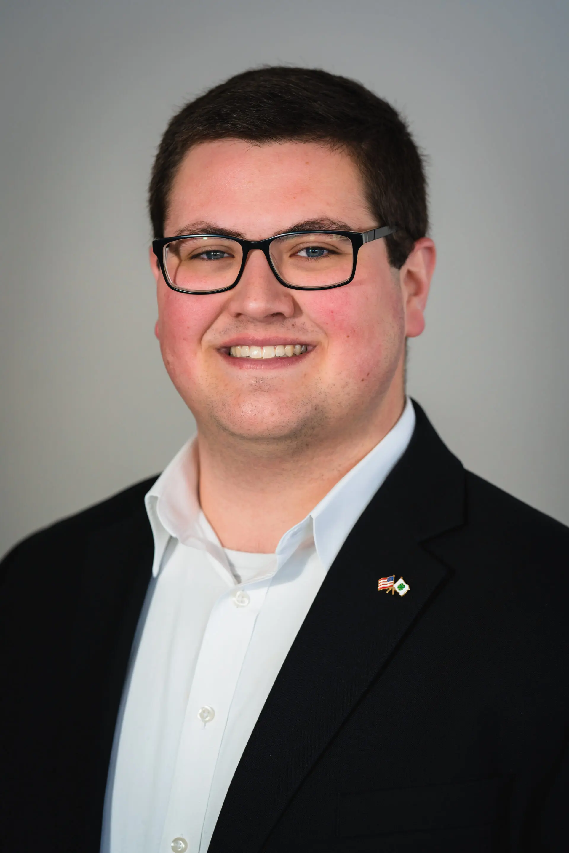 man in suit with glasses portrait