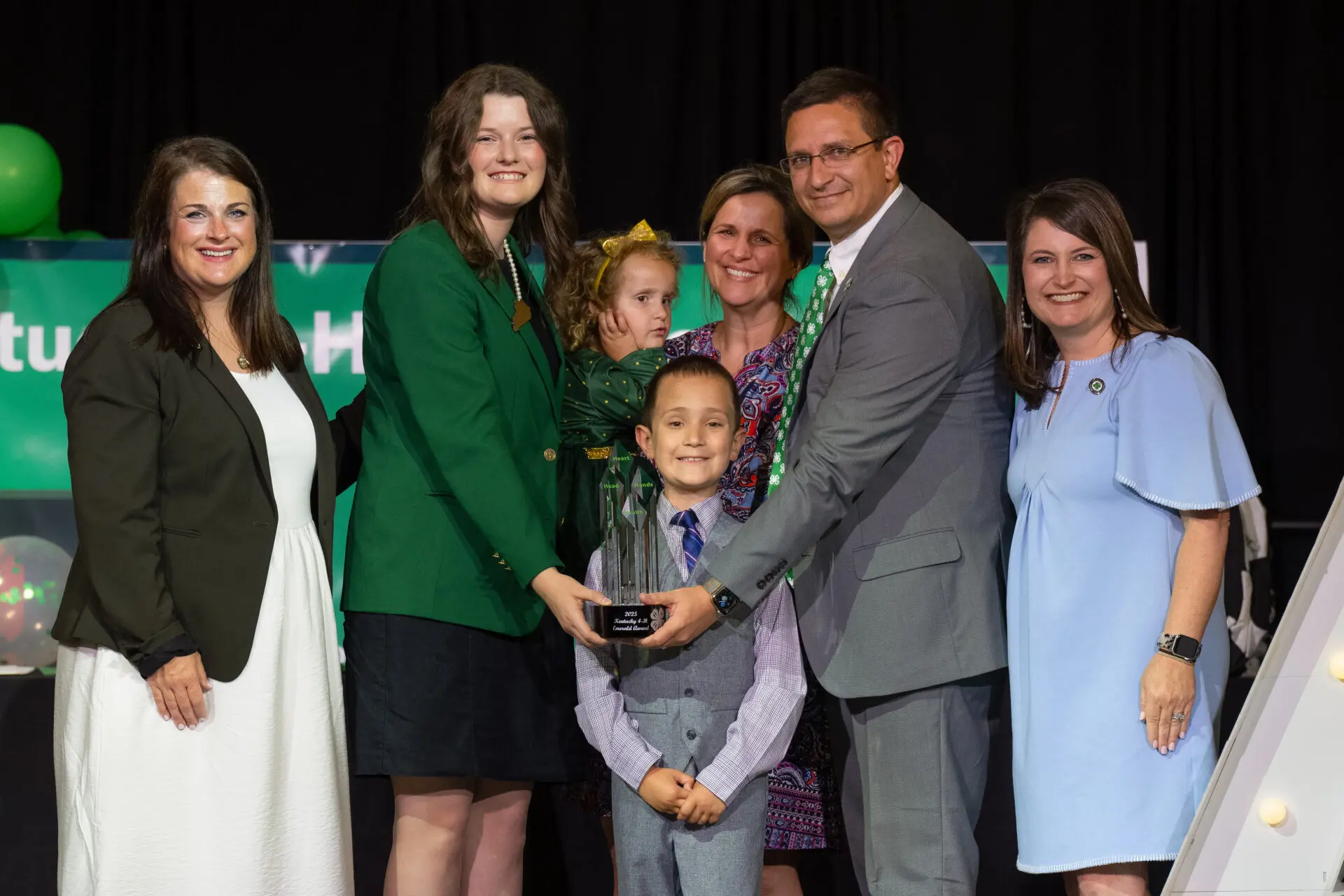 family getting an award from Kentucky 4-H advocacy